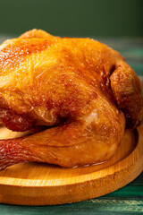 angle view honey roasted chicken at vertical composition