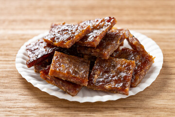 angle view dish of pork jerky