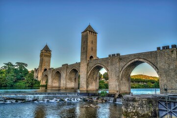 Fototapeta na wymiar Scenic view of the Pont Valentre arch bridge located in the city of Cahors, France
