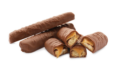 Sweet tasty chocolate bars with caramel on white background