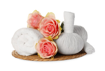 Beautiful spa composition with rolled towel, flowers and herbal bags on white background