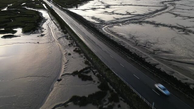 Drone footage of The Stroud causeway to Mersea Island at low tide.