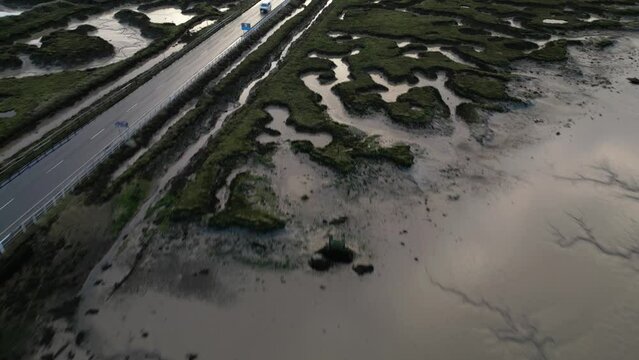 Drone footage of The Stroud causeway to Mersea Island at low tide.