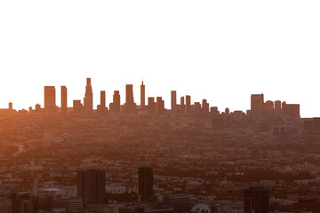 Smoggy orange sunrise cityscape view of Los Angeles and Hollywood from hilltop in the Santa Monica...