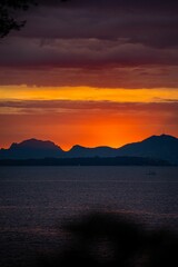 Dramatic scenery of a beautiful sunset in the sky over the sea in Cannes, France