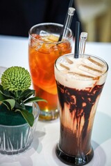 Vertical shot of juice and smoothie with ice