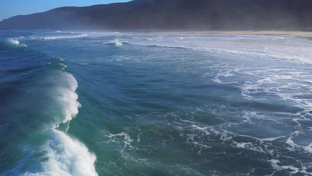 Slow-motion of the sea waves in Ferrol, Spain on a sunny day