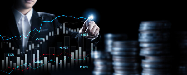 Businessman analyst working with digital finance business data graph showing technology of investment strategy for perceptive financial business decision. Digital economic analysis technology concept.