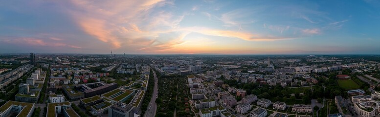 Fototapeta na wymiar Drone panoramic view of sunset cloudy sky over Munich cityscape