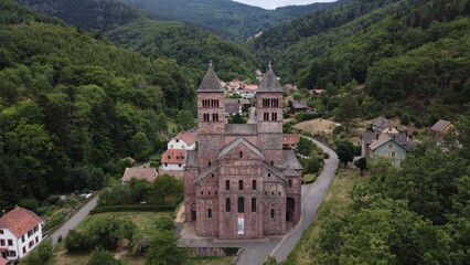 Aerial view of Abbey of Murbach between hills