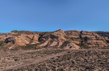 Beautiful shot of the Mormon Rocks under the clear sky in California
