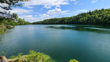 Beautiful view of a lake with green trees around