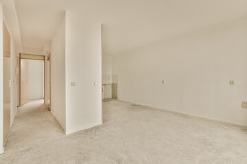 Obraz premium an empty room with white walls and no one person in the photo is taken from the other room, but it's very