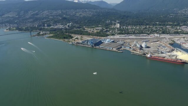 Scenic floatplane shot over Vancouver & explore the iconic Lions Gate Bridge.