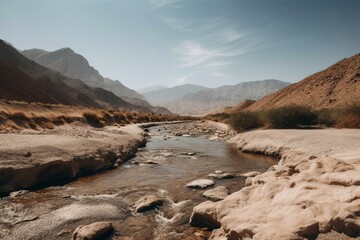 Fototapeta na wymiar A river flowing through desert with mountains in the background. Generative AI
