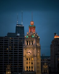 Vertical shot of the Wrigley building in Chicago, Illinois, at night