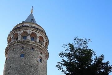 Fototapeta na wymiar Low angle view of a Galata Tower in in Istanbul