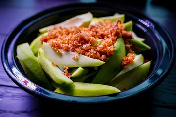Closeup of a dish with fresh mangoes