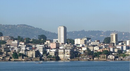 Drone shot of residential buildings in the Freetown harbor in Sierra Leone