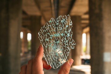 the shattered glass has just been peeled open in its crack