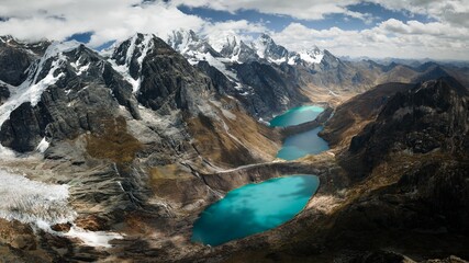 Fototapeta na wymiar Huayhuash Mountain Range over the azure lagoons in Peru
