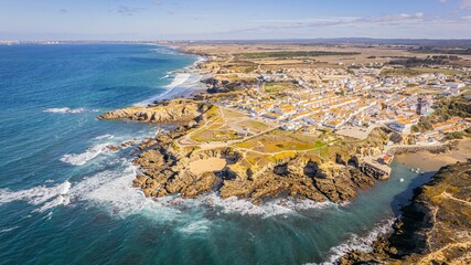 Aerial view of Zambujeira do Mar - charming town on cliffs by the Atlantic Ocean in Alentejo © Ervinfilms/Wirestock Creators
