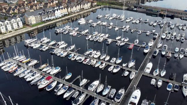 Drone view of beautiful boats in the port on a sunny day in Kent, UK