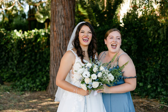 Laughing Bride and Bridesmaid