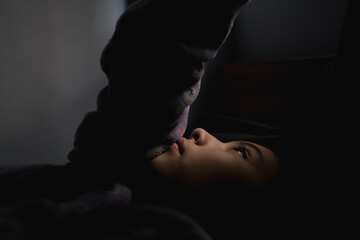 charming girl looking out the window