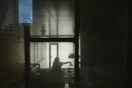 silhouette of girl cooking