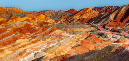 Panorama of Zhangye Danxia, Gansu, China. Danxia landform is formed from red mineral deposits being...