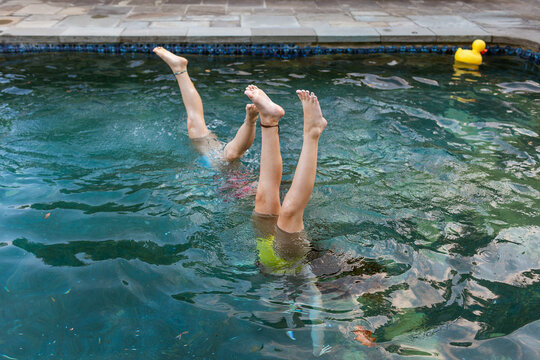 Women having fun inside the pool