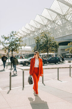 Woman in red in Lisbon downtown