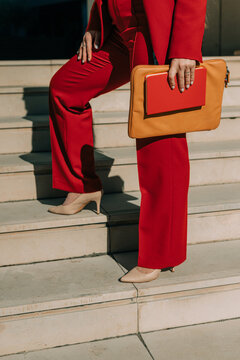 Anonymous businesswoman on the stairs 