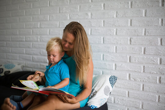 mother and son reading