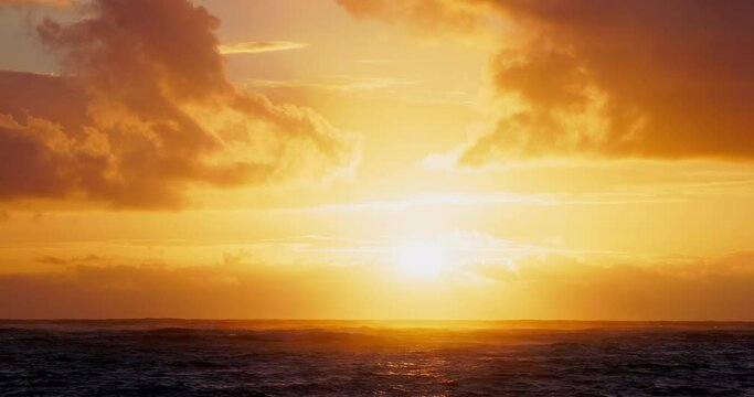 Golden tropical sunrise over the sea horizon 4K video
