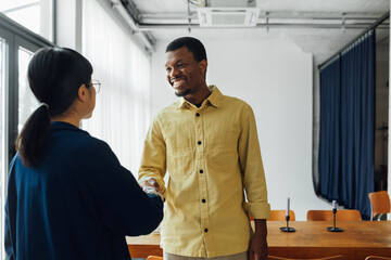 Man and Woman Shaking Hands