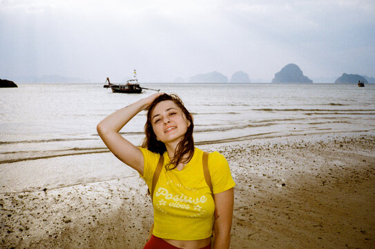 Woman  looking at camera on tropical beach. shot with flash