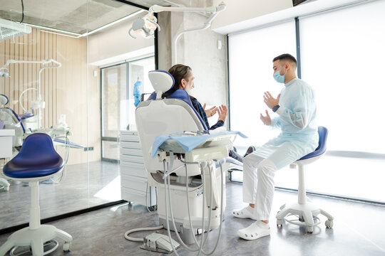 Dental chair. Specialist appointment. Mature. Protective clothing