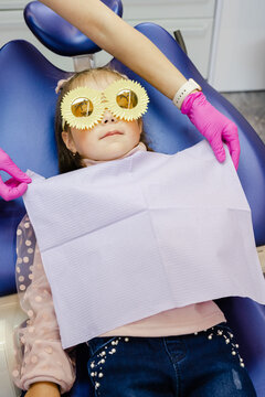 Anonymous kid  patient preparation healthcare dental checkup napkin
