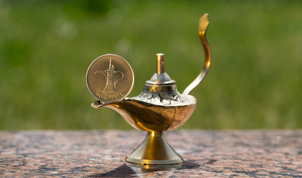 Aladdin's magic lamp and United Arab Emirates dirham 1 coin