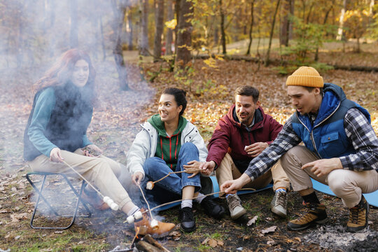 Friendship vacation conversation relationship campfire food picnic