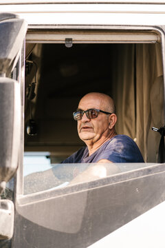 Senior male driver in truck