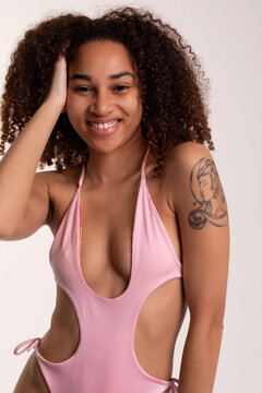 Attractive mixed race woman in swimwear