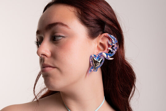 Female with jewel holographic earring