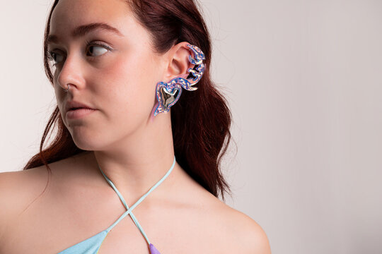 Female with jewel holographic earring