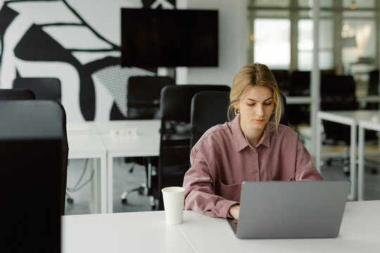Co-working workspace laptop connection isolated busy