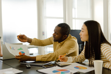 Manager group analysis data charts indoors