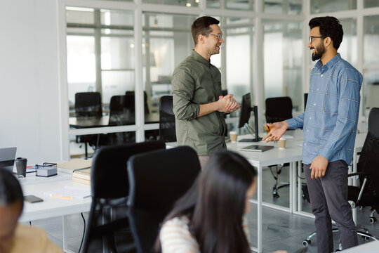 Casual office partner conversation workspace