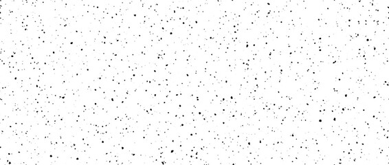 Seamless splashed dots texture. Black noise grain repeating pattern. Particles, splashes, drops, pieces, specks, speckles wallpaper. Random grunge gritty background. Vector backdrop